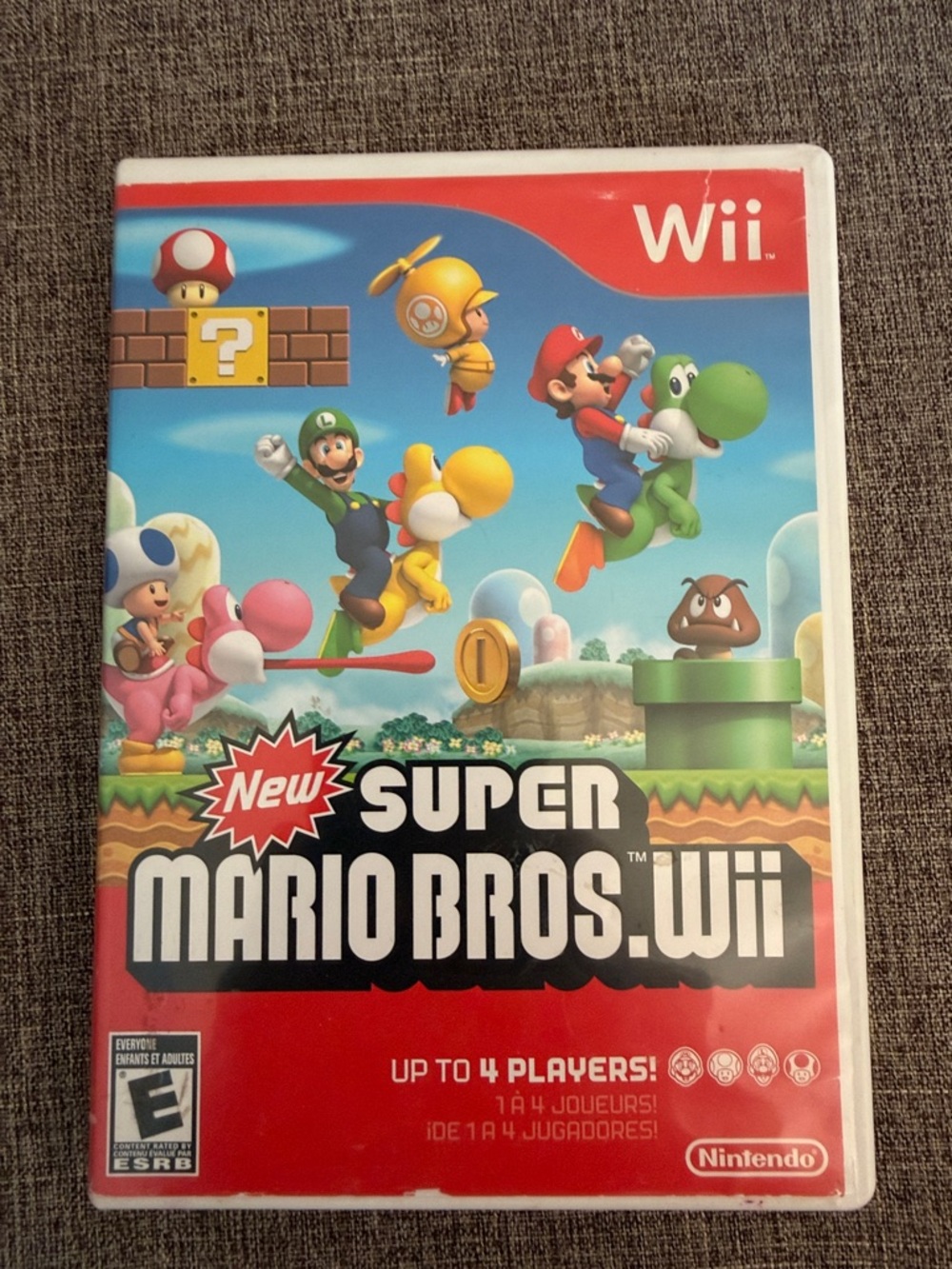 Super Mario Bros. Wii - case and disc
